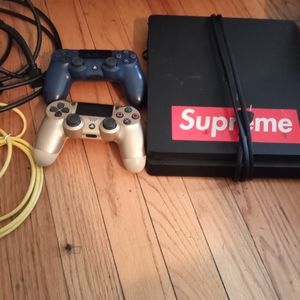 COPY - PlayStation 4 with two controllers